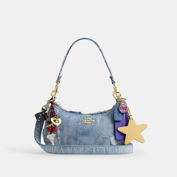 Coach Handbags - Coach Outlet Teri Shoulder Bag In Loved Denim With Charms NWT